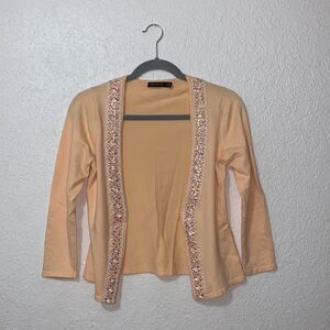 The limited Cream/orange cover up with sequins lining